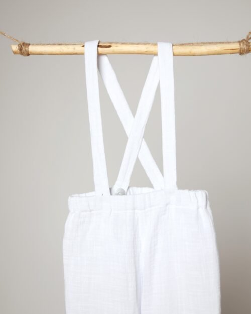 muslino kelnės su petnešėlėmis