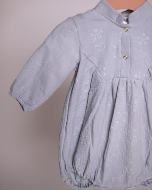 muslino kombinezonas