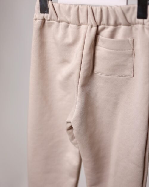 šviesios kelnės vaikams