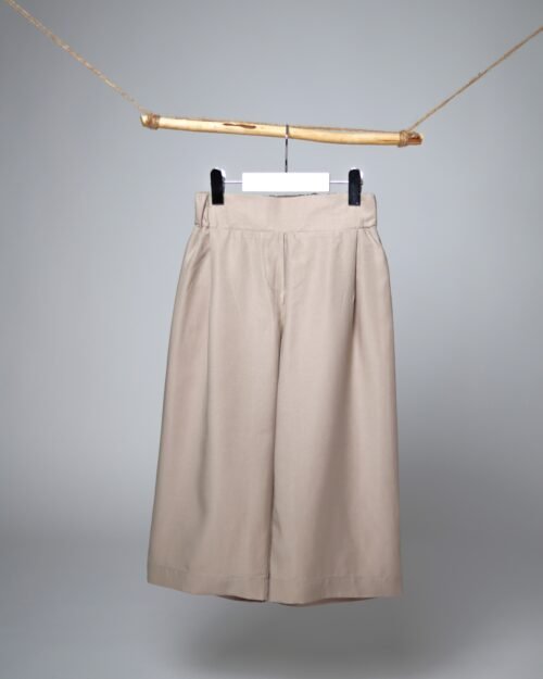 plačios tencelio kelnės