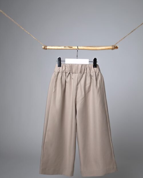 plačios kelnės vaikams